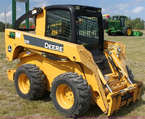 john deere 325 skid steer lift capacity|jd 325 skid steer manual.